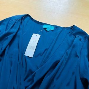 Blue romper, silky material. Size Small. Never worn